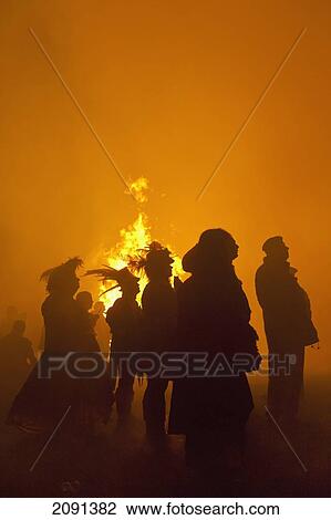 Silhouette Of People In Front Of Large Bonfire Watching Fireworks Display At Barcombe Bonfire Night, Barcombe, East Sussex, Uk View Large Photo Image Stock Image - Silhouette Of People In Front Of Large Bonfire Watching Fireworks Display At Barcombe Bonfire Night, Barcombe, East Sussex, Uk. Fotosearch