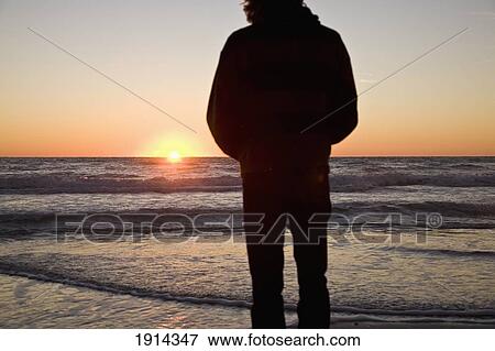 Stock Photo - Silhouette Of Person On Bradenton Beach. Fotosearch