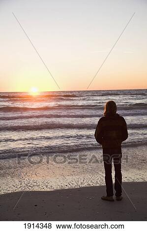 Stock Photo - Silhouette Of Person On Bradenton Beach. Fotosearch