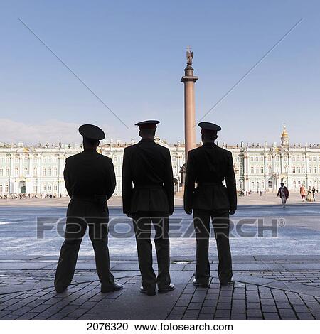 Silhouette Of Three Officers Standing With The Winter Palace In Front Of Them; St. Petersburg Russia View Large Photo Image Stock Image - Silhouette Of Three Officers Standing With The Winter Palace In Front Of Them; St. Petersburg Russia. Fotosearch