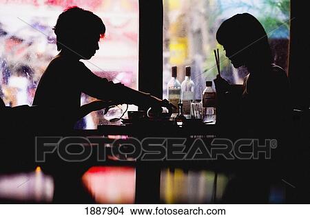 Silhouette Of Two Young Women At Table In Cafe View Large Photo Image Picture - Silhouette Of Two Young Women At Table In Cafe. Fotosearch