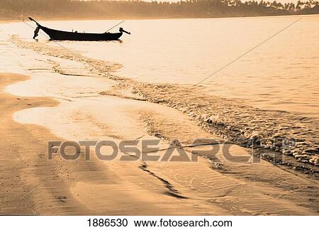 Silhouetted Boat On Palolem Beach, Goa View Large Photo Image Stock Image - Silhouetted Boat On Palolem Beach, Goa. Fotosearch