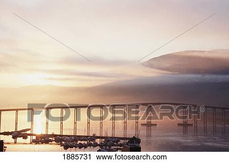 Silhouetted Bridge Over Tromso Sound At Sunset View Large Photo Image Stock Image - Silhouetted Bridge Over Tromso Sound At Sunset. Fotosearch