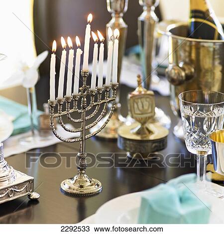 Silver menora on dining table; Victoria vancouver island british columbia canada View Large Photo Image Stock Image - Silver menora on dining table; Victoria vancouver island british columbia canada. Fotosearch