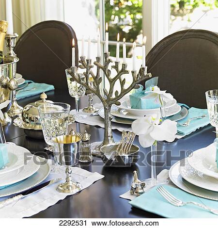 Silver menora on hanukkah table setting; Victoria vancouver island british columbia canada View Large Photo Image Stock Image - Silver menora on hanukkah table setting; Victoria vancouver island british columbia canada. Fotosearch