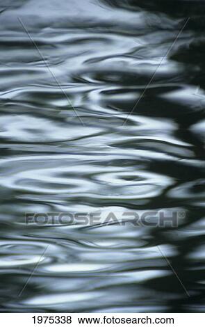 Stock Photo - Silver Water Ripples And Light Reflections.. Fotosearch