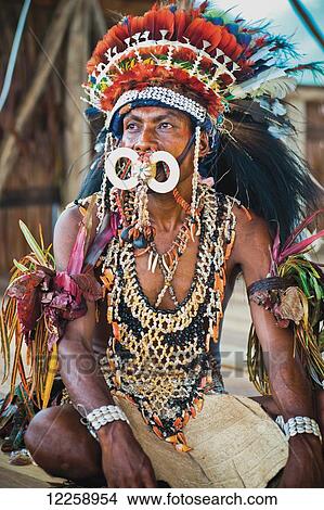 Picture - Sing-Sing performer at Milne Bay Canoe Festival; Tufi, Milne Bay Province, Papua New Guinea. Fotosearch