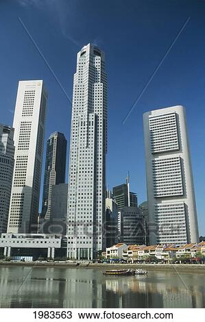 Stock Image - Singapore river and Boat Quay; Singapore. Fotosearch
