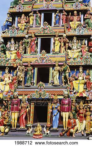 Stock Image - Singapore, Sri Mariamman Temple, Close-Up Of Colorful Handpainted Figurines. Fotosearch