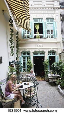 Sitting Outside A Restaurant; Hanoi, Vietnam View Large Photo Image Picture - Sitting Outside A Restaurant; Hanoi, Vietnam. Fotosearch