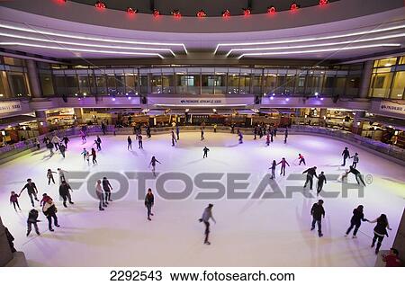Stock Image - Skating rink at atrium le 1000; Montreal quebec canada. Fotosearch