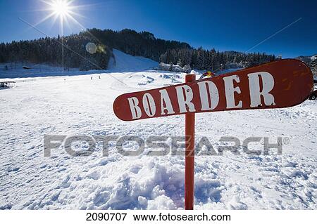 Stock Photo - Ski Slope With Snowboard Sign Saying 'boarder' At Ski And Snowboard Resort In Waidring, Austrian Alps, Austria. Fotosearch