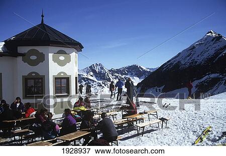 Stock Photo - Skiers At Mountain Cafe. Fotosearch