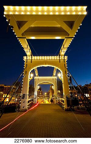 Skinny bridge at dusk; Amsterdam, Holland View Large Photo Image Stock Image - Skinny bridge at dusk; Amsterdam, Holland. Fotosearch