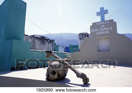 Stock Image - Skull And Crossed Bones On Grave; Port Au Prince, Haiti. Fotosearch