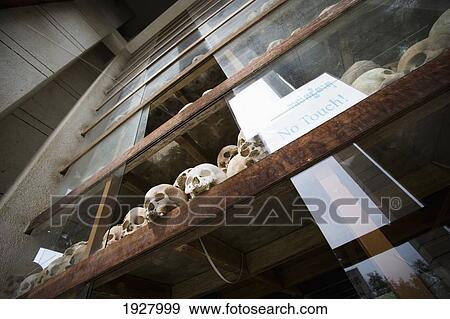 Stock Photo - Skulls Inside Memorial Stupa At Killing Fields, Choeung Ek, Cambodia. Fotosearch