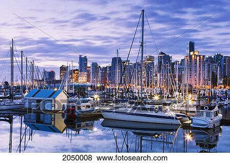 Stock Photo - Skyline And Coal Harbour At Dawn, Vancouver, British Columbia. Fotosearch