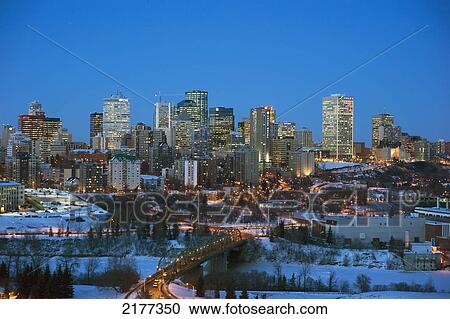 Stock Image - Skyline Of Edmonton With Lights Illuminating Buildings And Bridge; Edmonton Alberta Canada. Fotosearch