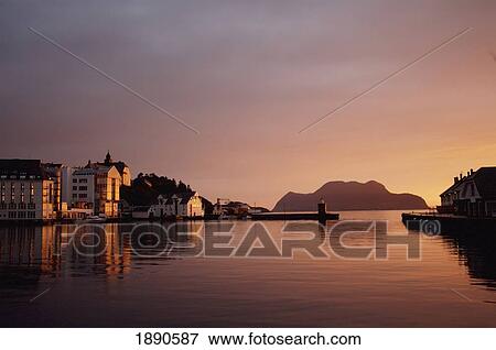 Stock Photo - Skyline Of Town At Dusk. Fotosearch