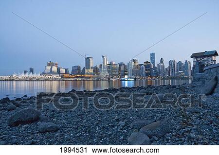 Skyline Of Vancouver And Nine O'clock Gun In Stanley Park, British Columbia, Canada View Large Photo Image Stock Image - Skyline Of Vancouver And Nine O'clock Gun In Stanley Park, British Columbia, Canada. Fotosearch