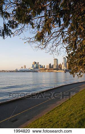 Skyline Of Vancouver And Nine O'clock Gun In Stanley Park, Vancouver, British Columbia, Canada View Large Photo Image Stock Image - Skyline Of Vancouver And Nine O'clock Gun In Stanley Park, Vancouver, British Columbia, Canada. Fotosearch