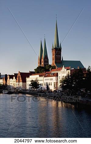 Skyline Reflected In The Holstenhafen, Lubeck, Germany View Large Photo Image Stock Photo - Skyline Reflected In The Holstenhafen, Lubeck, Germany. Fotosearch