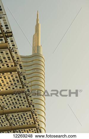 Skyscraper in financial district; Milan, Lombardy, Italy View Large Photo Image Stock Photo - Skyscraper in financial district; Milan, Lombardy, Italy. Fotosearch