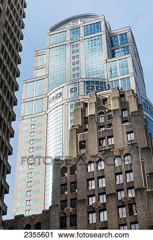 Stock Image - Skyscrapers Against A Blue Sky; Seattle, Washington, United States Of America. Fotosearch