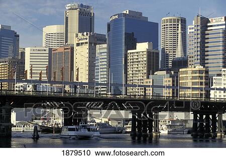 Stock Image - Skyscrapers And Bridge At Darling Harbor. Fotosearch