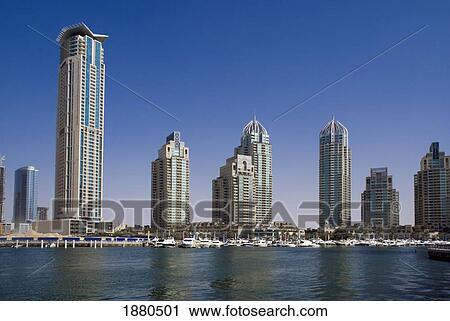 Skyscrapers And Yachts In Dubai Marina View Large Photo Image Stock Image - Skyscrapers And Yachts In Dubai Marina. Fotosearch