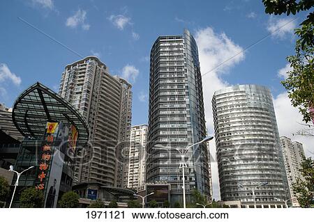 Skyscrapers In An Urban Area; Kunming Yunnan China View Large Photo Image Stock Image - Skyscrapers In An Urban Area; Kunming Yunnan China. Fotosearch