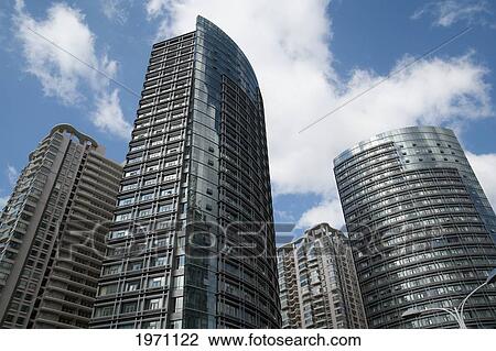 Skyscrapers In An Urban Area; Kunming Yunnan China View Large Photo Image Stock Image - Skyscrapers In An Urban Area; Kunming Yunnan China. Fotosearch