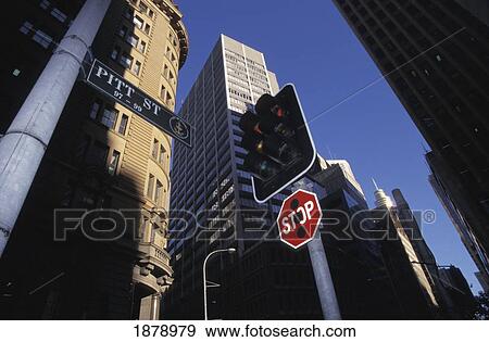 Stock Photo - Skyscrapers, Stop Sign, And Traffic Light At Pitt Street, Low Angle View. Fotosearch