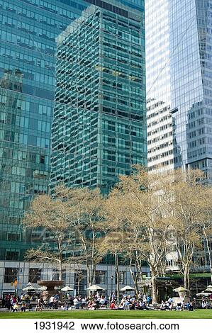 Skyscrapers Surrounding Bryant Park And People Enjoying The Sun, Garment District, Manhattan, New York, Usa View Large Photo Image Stock Image - Skyscrapers Surrounding Bryant Park And People Enjoying The Sun, Garment District, Manhattan, New York, Usa. Fotosearch