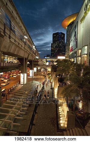 Skytrain At Siam Centre And Busy Street At Night; Bangkok Thailand View Large Photo Image Stock Photo - Skytrain At Siam Centre And Busy Street At Night; Bangkok Thailand. Fotosearch