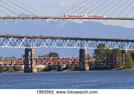 Skytrain Bridge And Pattullo Bridge, New Westminster, British Columbia, Canada View Large Photo Image Stock Photography - Skytrain Bridge And Pattullo Bridge, New Westminster, British Columbia, Canada. Fotosearch