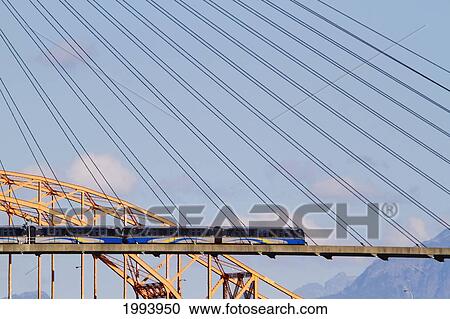 Stock Image - Skytrain Bridge, New Westminster, British Columbia, Canada. Fotosearch