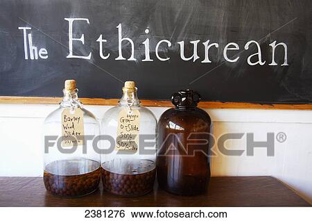 Stock Photograph - Sloes steeping in alcohol, The Ethicurean restaurant, Barley Wood Walled Garden; Wrington, England. Fotosearch