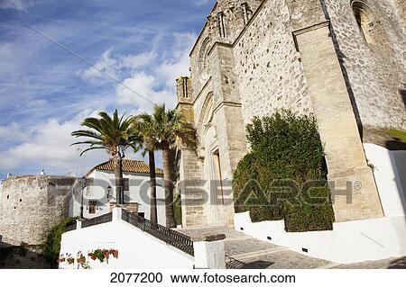 Stock Image - Sloped Ramp Beside A Building With Palm Trees And Plants; Vejer De La Frontera Andalusia Spain. Fotosearch