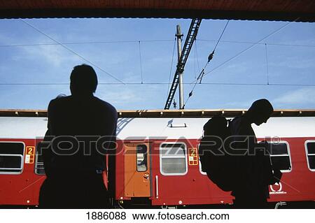 Stock Photo - Slovakia, Silhouette Of Backpacker Waiting For Train; Bratislava. Fotosearch