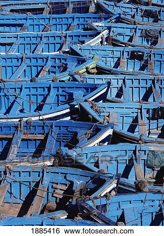 Small Blue Boats Tied Together In Harbor, Close Up View Large Photo Image Stock Photograph - Small Blue Boats Tied Together In Harbor, Close Up. Fotosearch