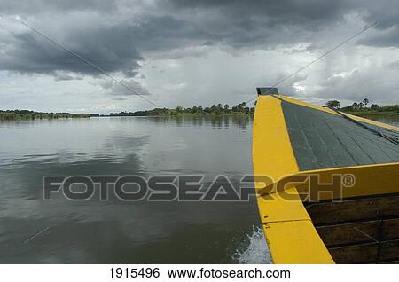 Small Boat Going Up The Shire River View Large Photo Image Stock Photograph - Small Boat Going Up The Shire River. Fotosearch