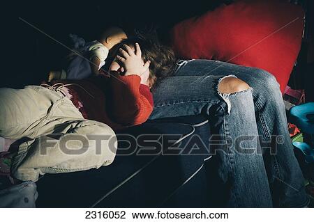 Small Girl Lying On Her Mother's Lap And Hiding Her Face; Otterburn Park Quebec Canada View Large Photo Image Stock Image - Small Girl Lying On Her Mother's Lap And Hiding Her Face; Otterburn Park Quebec Canada. Fotosearch