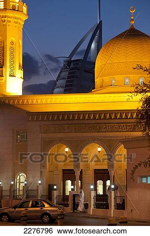Small mosque with the Burj Al Arab hotel behind; Dubai, United Arab Emirates View Large Photo Image Stock Photograph - Small mosque with the Burj Al Arab hotel behind; Dubai, United Arab Emirates. Fotosearch