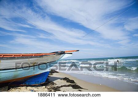Small Striped Fishing Boat On The Beach View Large Photo Image Stock Image - Small Striped Fishing Boat On The Beach. Fotosearch
