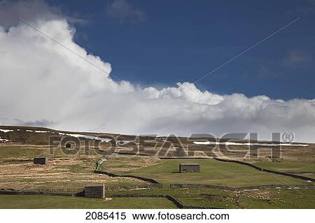 Small Structures Scattered Across A Grass Landscape With Traces Of Snow; Swaledale England View Large Photo Image Stock Photography - Small Structures Scattered Across A Grass Landscape With Traces Of Snow; Swaledale England. Fotosearch