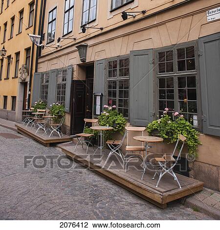 Small Tables And Chairs On A Patio Outside A Restaurant; Stockholm Sweden View Large Photo Image Stock Image - Small Tables And Chairs On A Patio Outside A Restaurant; Stockholm Sweden. Fotosearch
