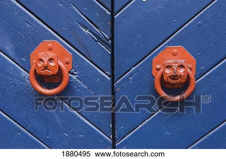 Stock Photography - Smiling And Unhappy Door Handle Faces, Close Up. Fotosearch