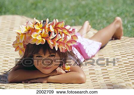 Smiling Local Girl Rests Chin On Hands, Lauhala Mat, Wearing Plumeria Haku View Large Photo Image Stock Photo - Smiling Local Girl Rests Chin On Hands, Lauhala Mat, Wearing Plumeria Haku. Fotosearch