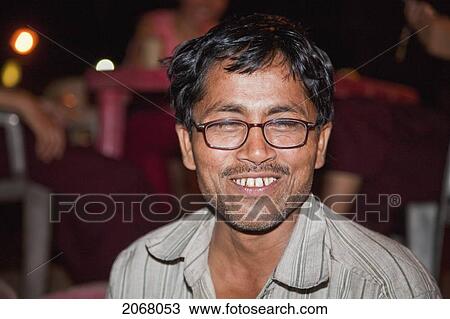 Stock Image - Smiling Man, Bodhgaya, Bihar, India. Fotosearch